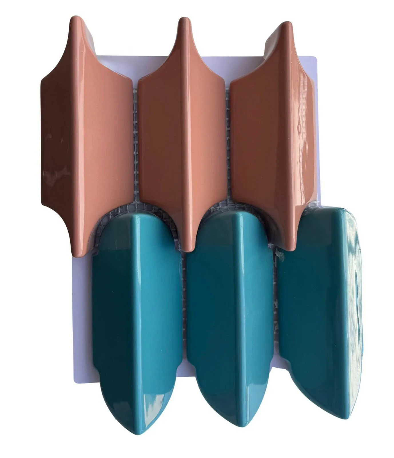 Terracotta and teal 3D glazed ceramic mosaic on mesh backing.