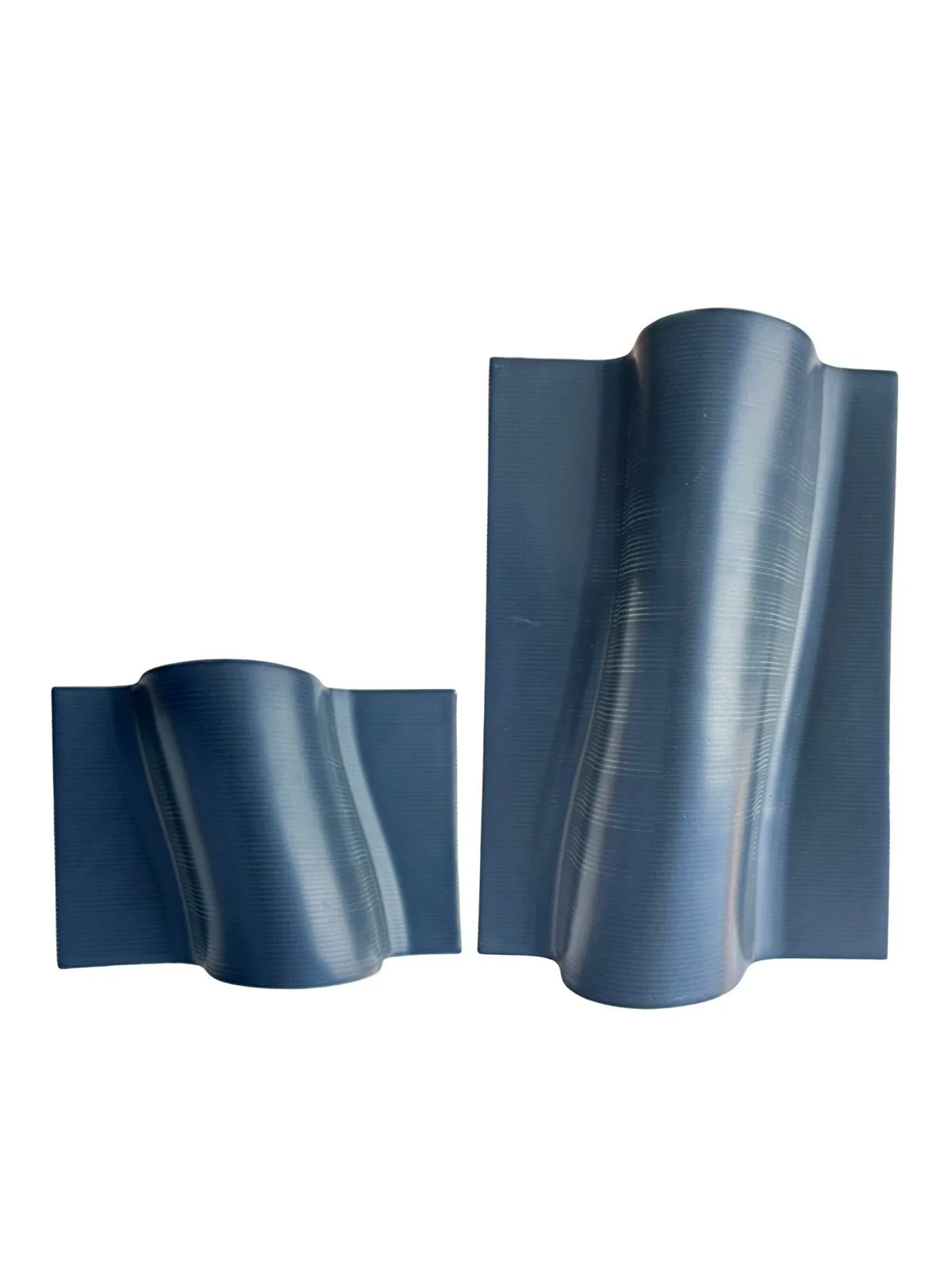 Deep blue curved ceramic mosaic pieces.