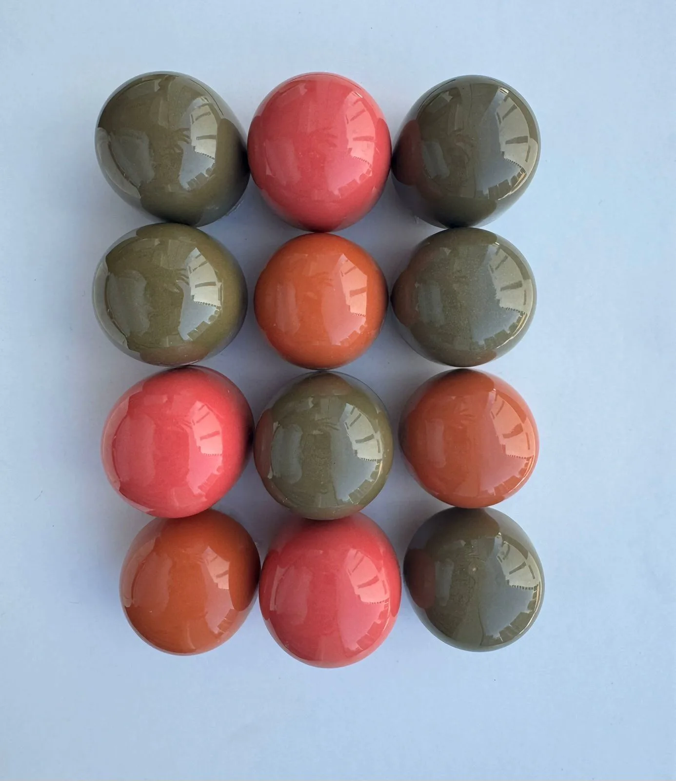 Multicolored rounded glazed ceramic wall tile mosaic.