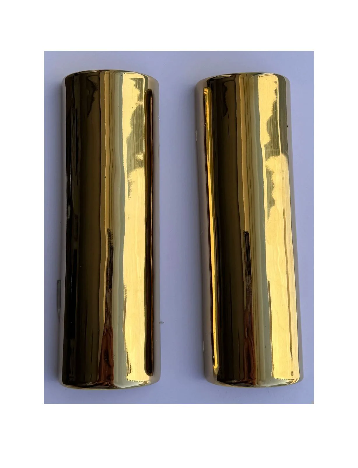 Gold glazed ceramic mosaic pieces.