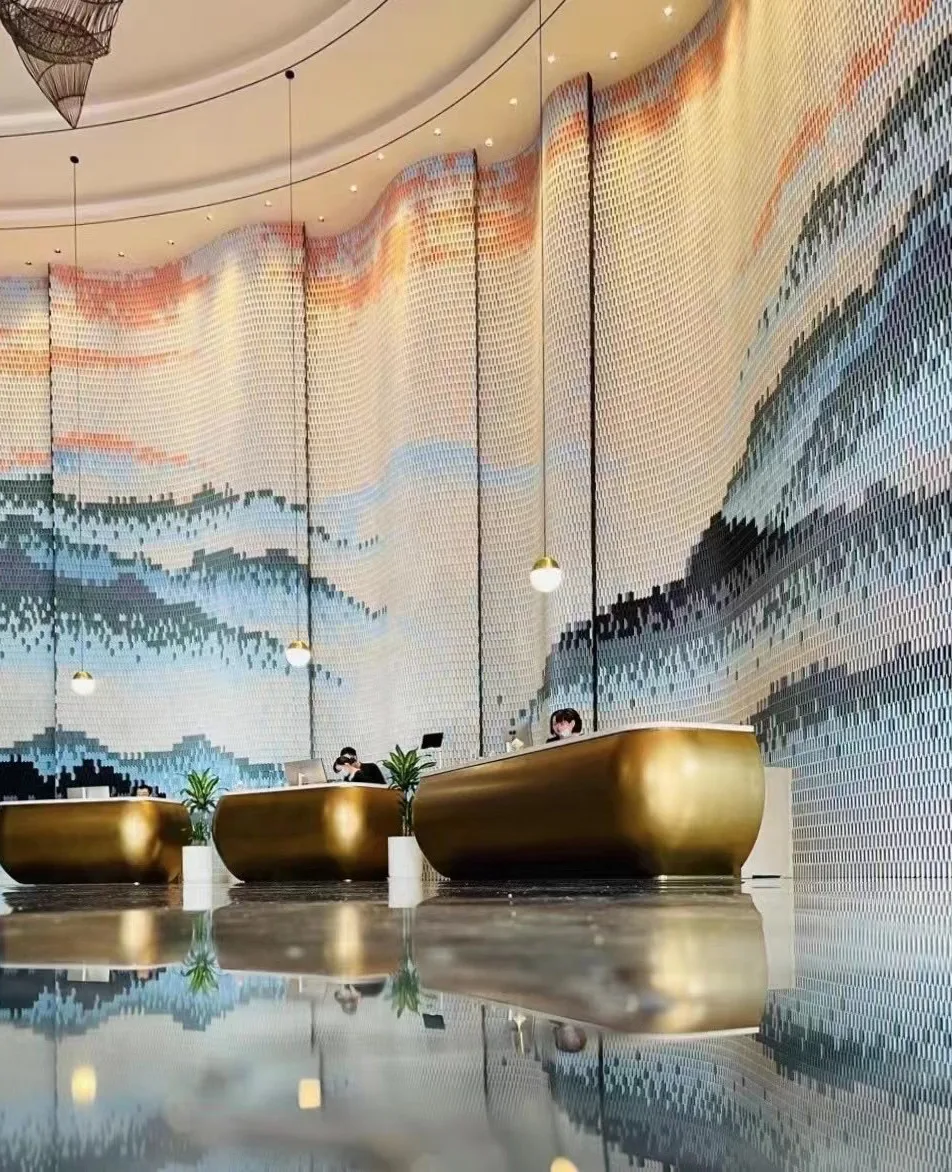 Wuhan Kaiyuan Hotel interior with layered blue and white glazed mosaic surfaces.
