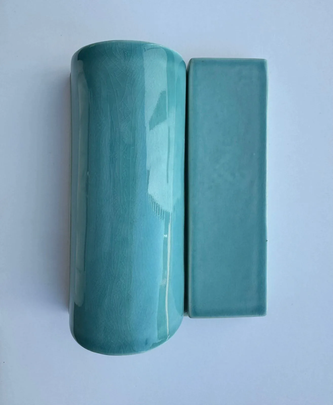 Turquoise glazed ceramic mosaic pieces.
