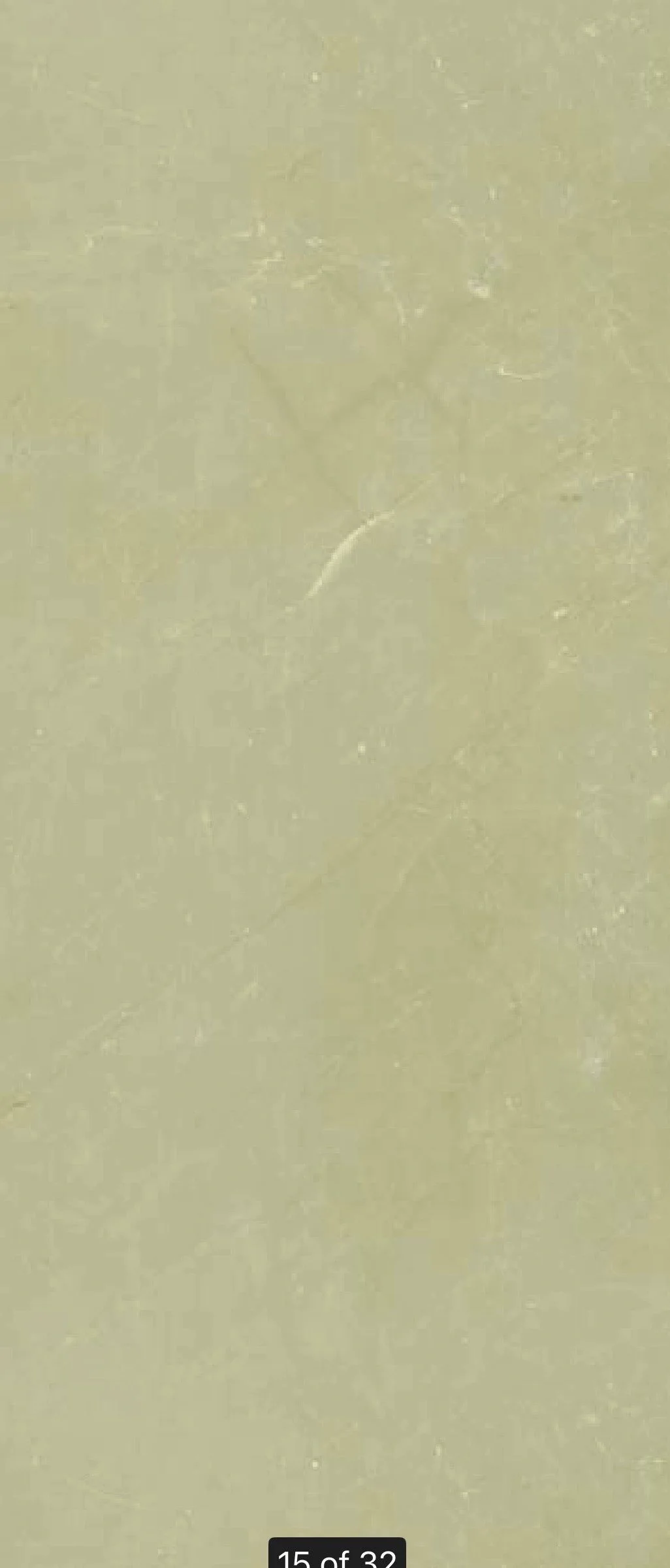 Monreale Ivory mineral wall panel texture.