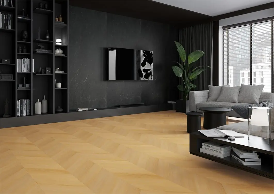 Modern living room with a dark MODEE mineral wall, chevron wood flooring, and black accents.