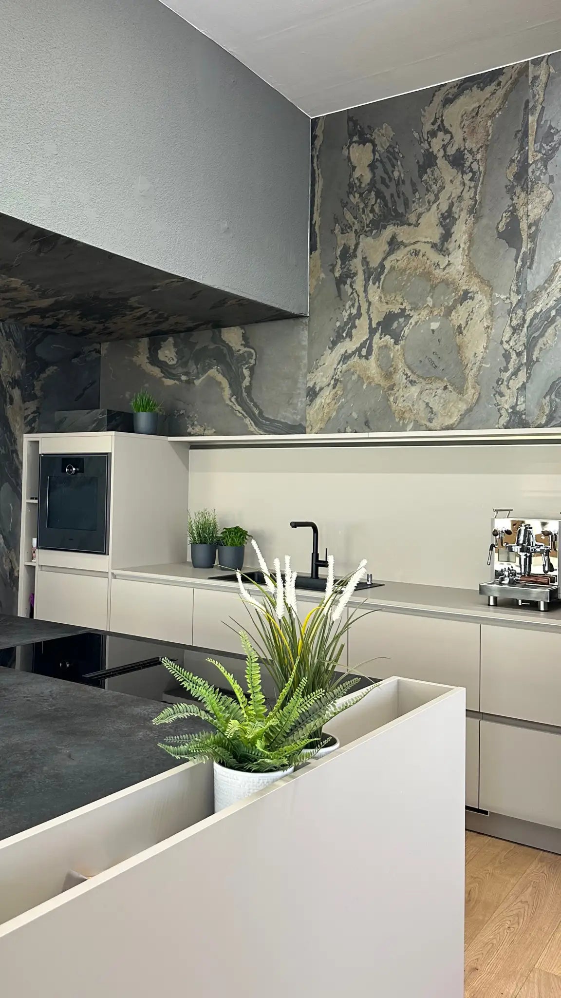 Real stone veneer — Natural stone veneer kitchen backsplash.