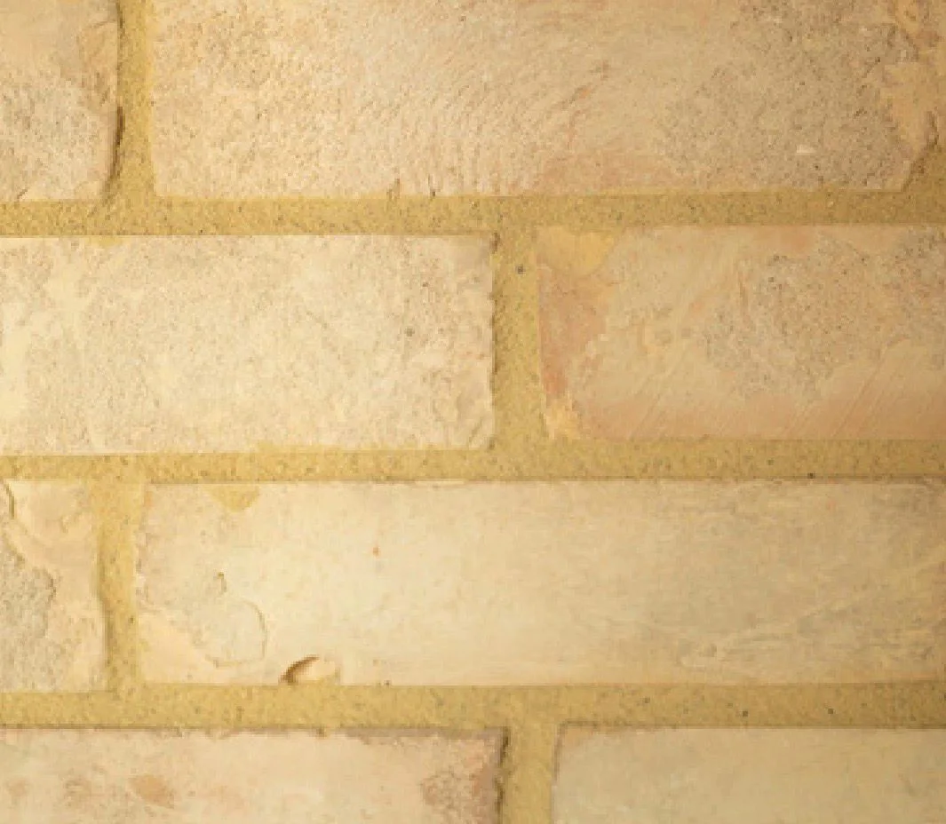 CALIBRATED YELLOW reclaimed brick wall texture.