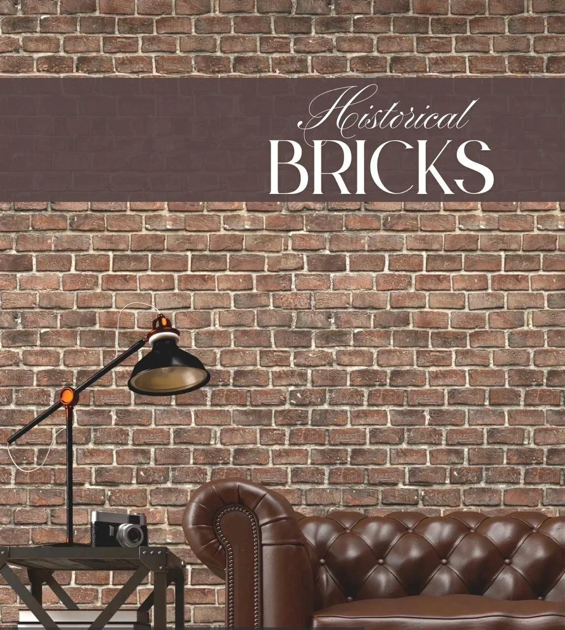 Historical reclaimed brick wall with a leather sofa and decorative objects.
