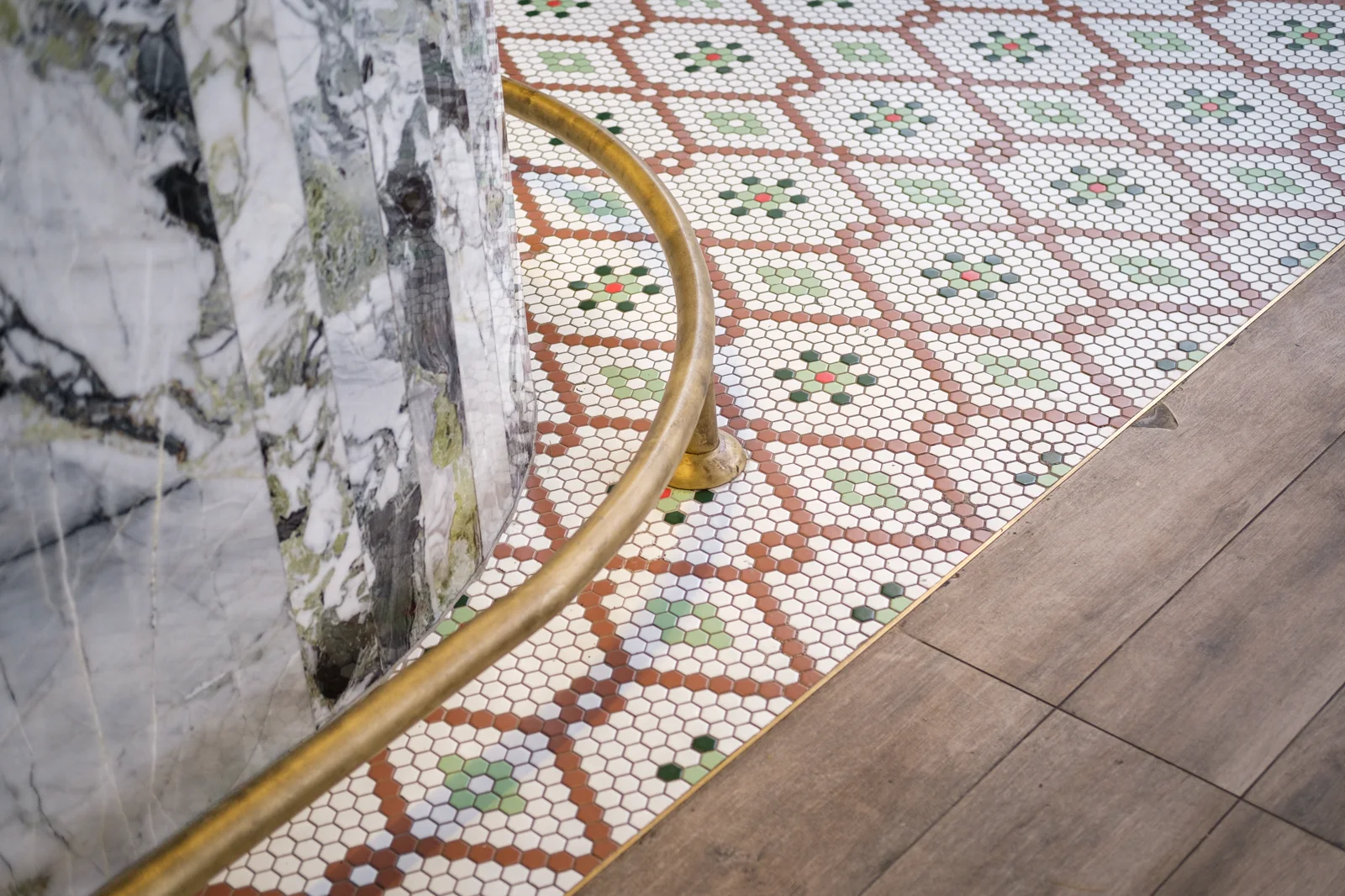 Close view of geometric tilework and layered material details.